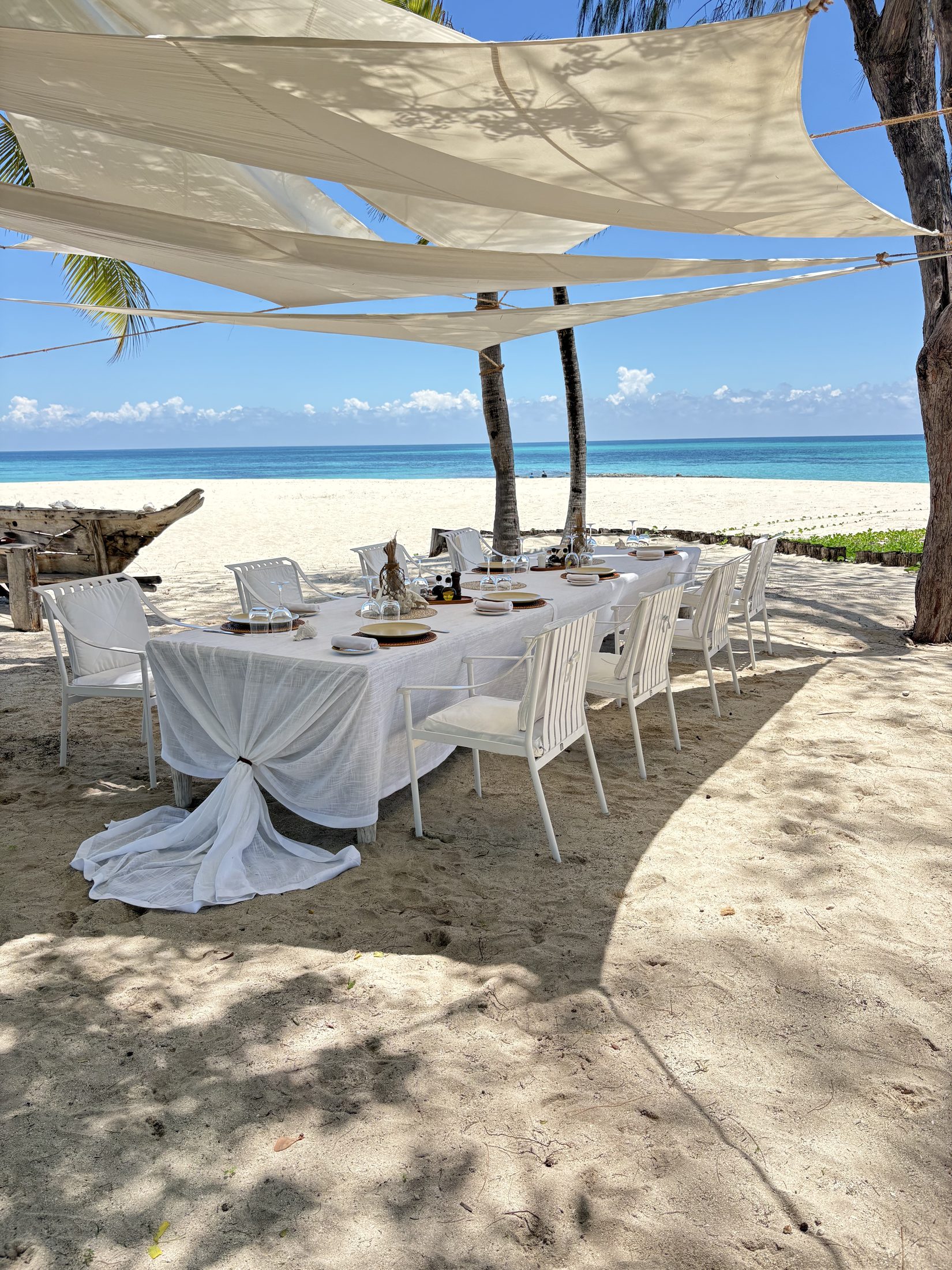 Private beach dining setup