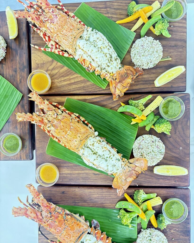 Grilled spiny lobster on banana leaf by chef Javi Puig, Tanzania